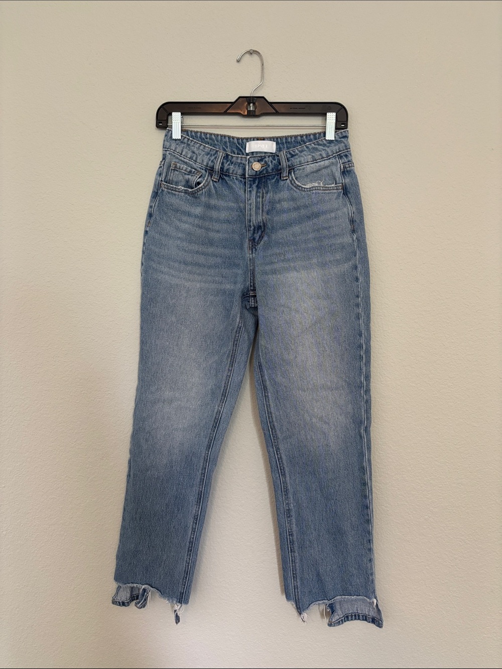 Straight-Leg Light Blue Women’s Jeans with Frayed Hem